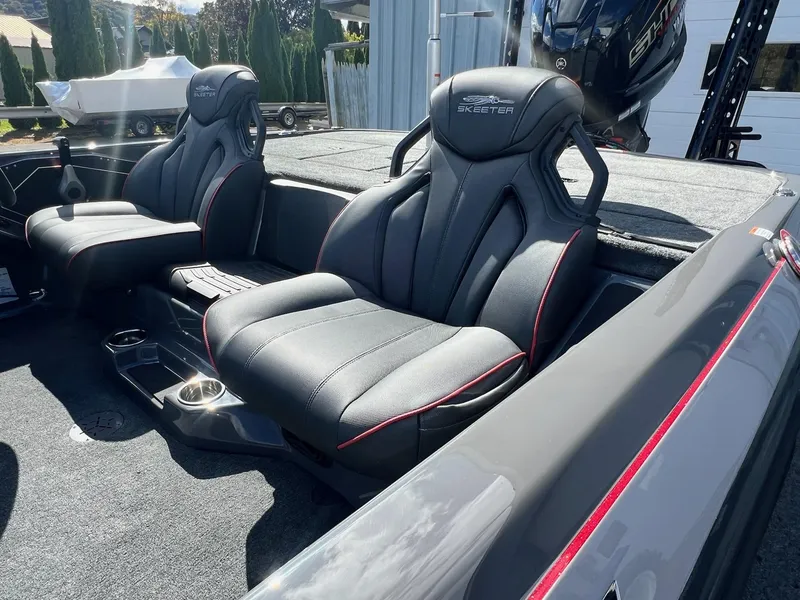 Slide: The Image of 2025 Skeeter ZXR 21 boat interior with sleek black seats and modern design. - 41