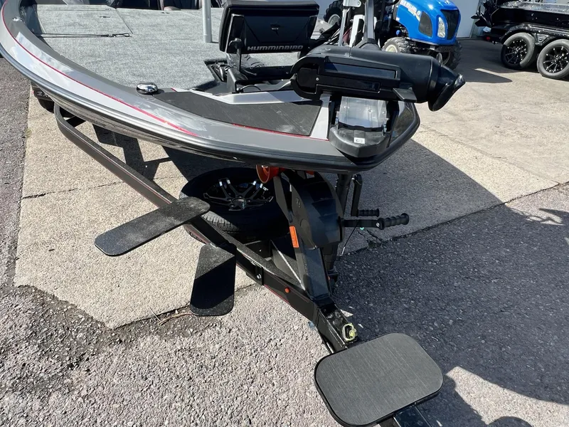Slide: The Image of 2025 Skeeter ZXR 21 boat on trailer, featuring advanced equipment and sleek design. - 43