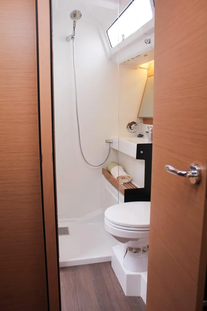 Slide: The Image of 2025 Jeanneau Sun Odyssey 440 bathroom with shower, toilet, and modern fixtures. - 26