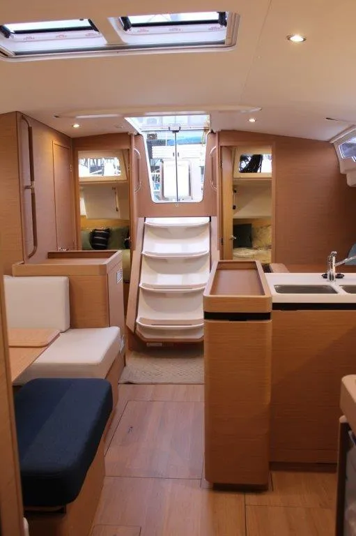 Slide: The Image of 2024 Jeanneau Sun Odyssey 490 interior with modern design and spacious layout. - 37
