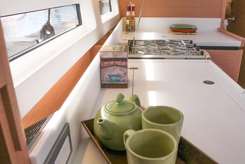 Slide: The Image of Modern kitchen interior of 2024 Jeanneau Sun Odyssey 490 yacht with teapot and cups. - 9