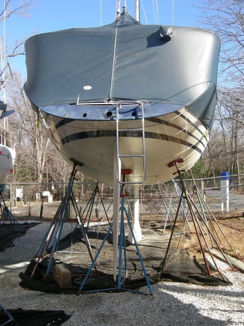 Slide: The Image of 2001 X-Yachts X-412 Mk III sailboat on stands, viewed from the stern. - 13
