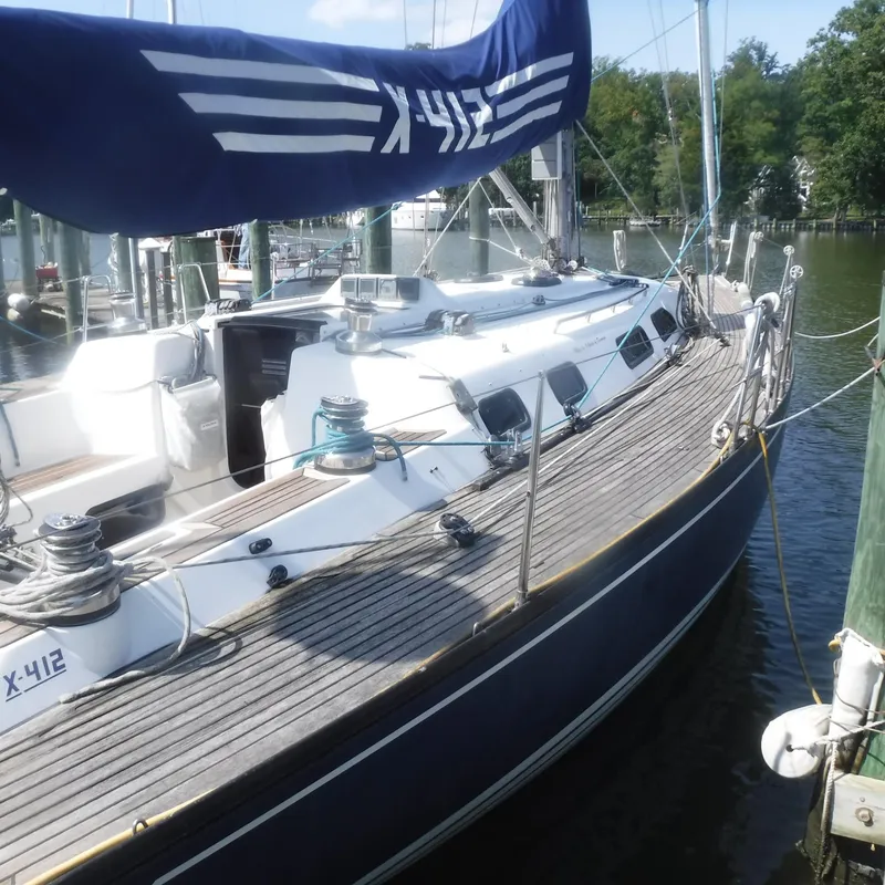 Slide: The Image of X-Yachts 2002 Model X-412 Mk III sailboat docked at marina, side view. - 16