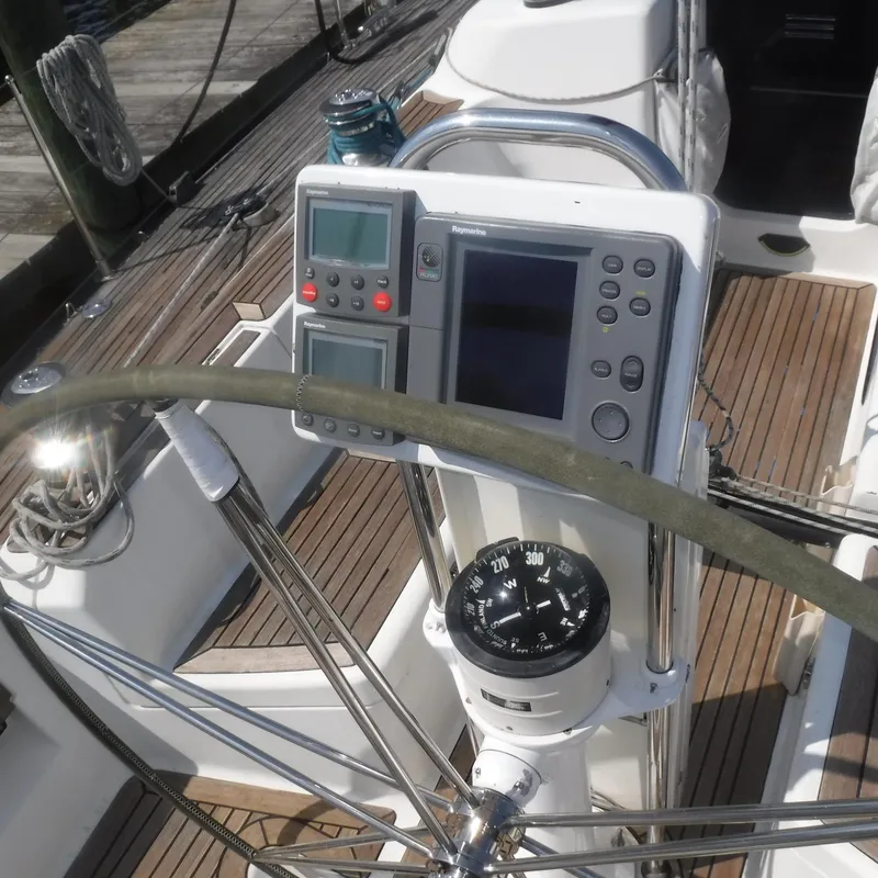 Slide: The Image of Steering wheel and navigation instruments on 2001 X-Yachts X-412 Mk III sailboat. - 27