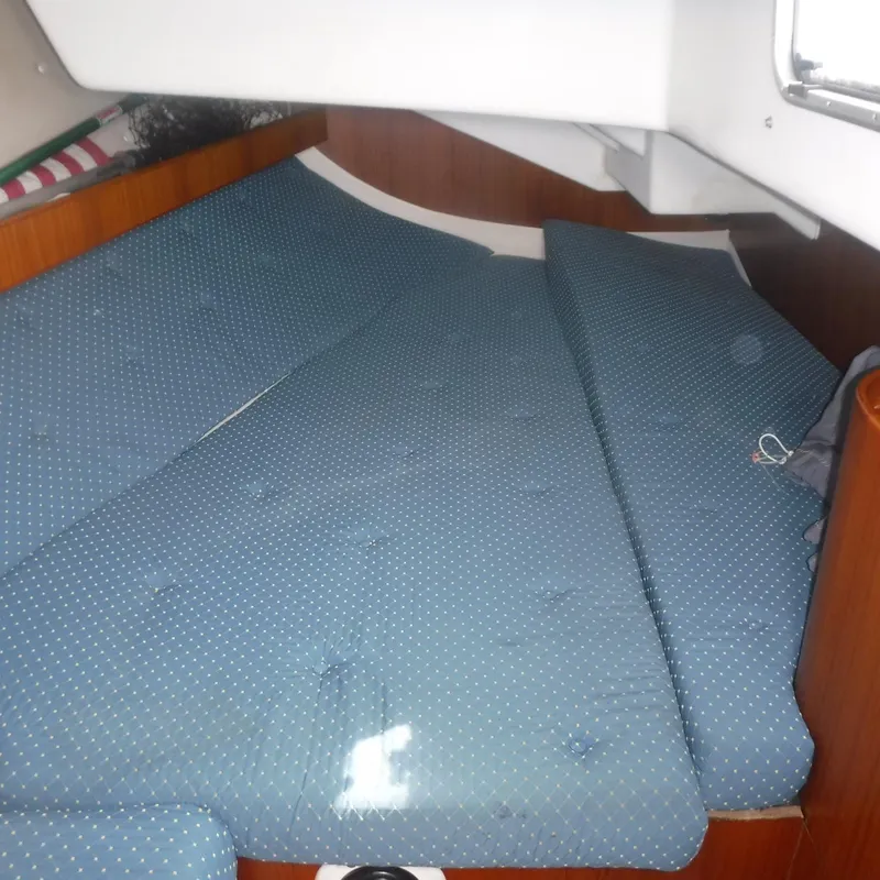 Slide: The Image of Interior cabin of 2001 X-Yachts X-412 Mk III with blue cushions. - 33