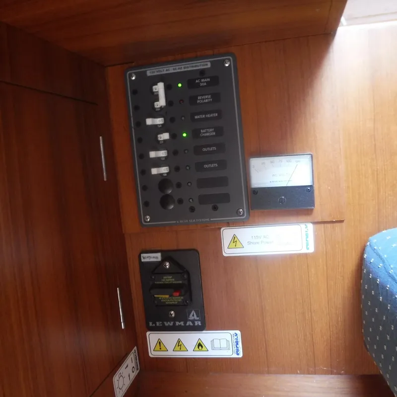 Slide: The Image of Control panel of 2002 X-Yachts X-412 Mk III, featuring switches and indicators. - 49