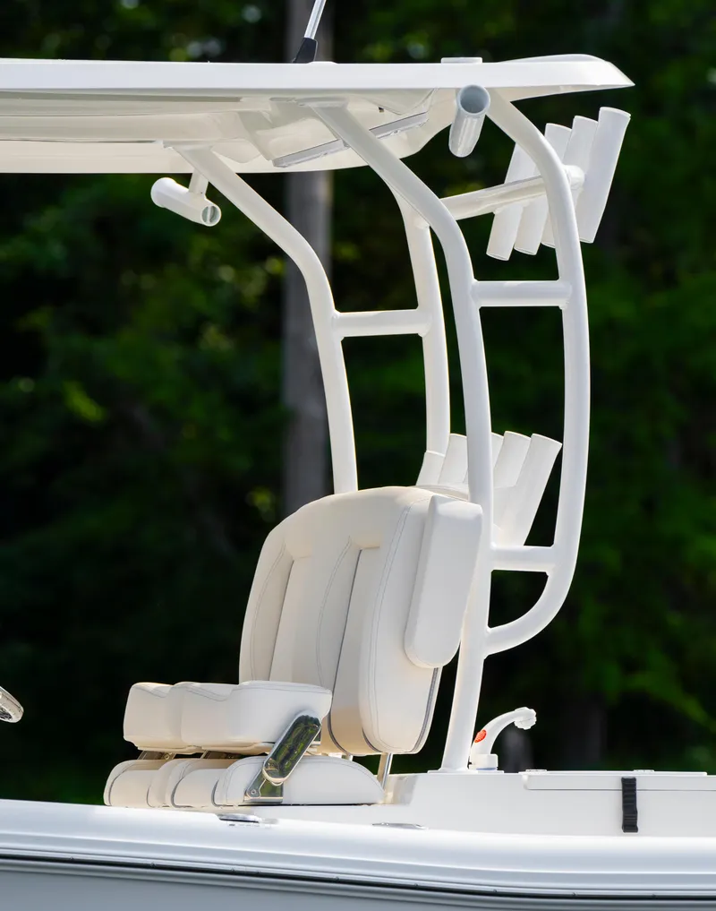 Slide: The Image of 2025 Sea Hunt Gamefish 30 boat with coffin box, featuring a sleek white design. - 24