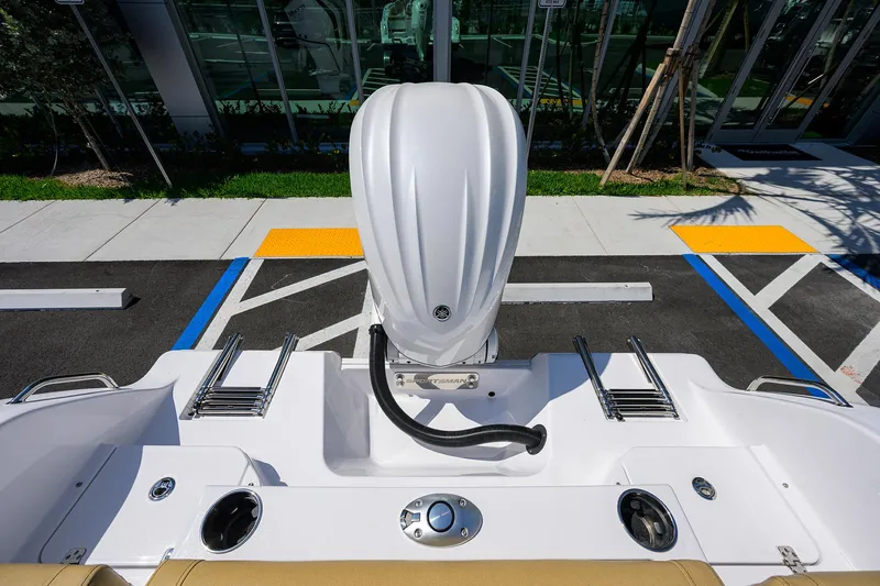 Slide: The Image of 2025 Sportsman Heritage 231 Center Console boat engine and deck view. - 23