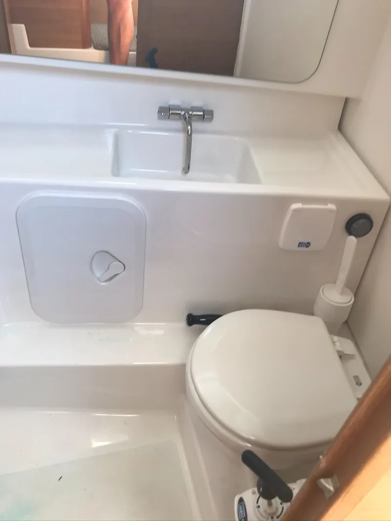 Slide: The Image of Modern bathroom in 2024 Nimbus C9 boat with compact sink and toilet. - 24