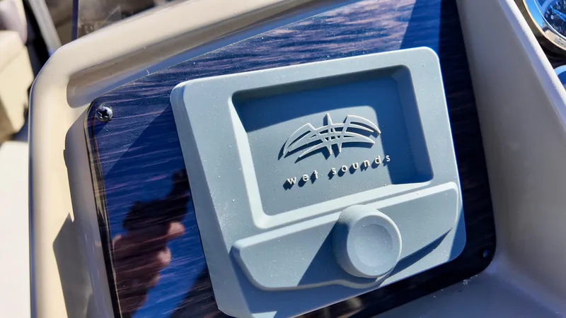 Slide: The Image of Wet Sounds audio system on 2025 Sylvan Mirage 820 LZ boat dashboard. - 11