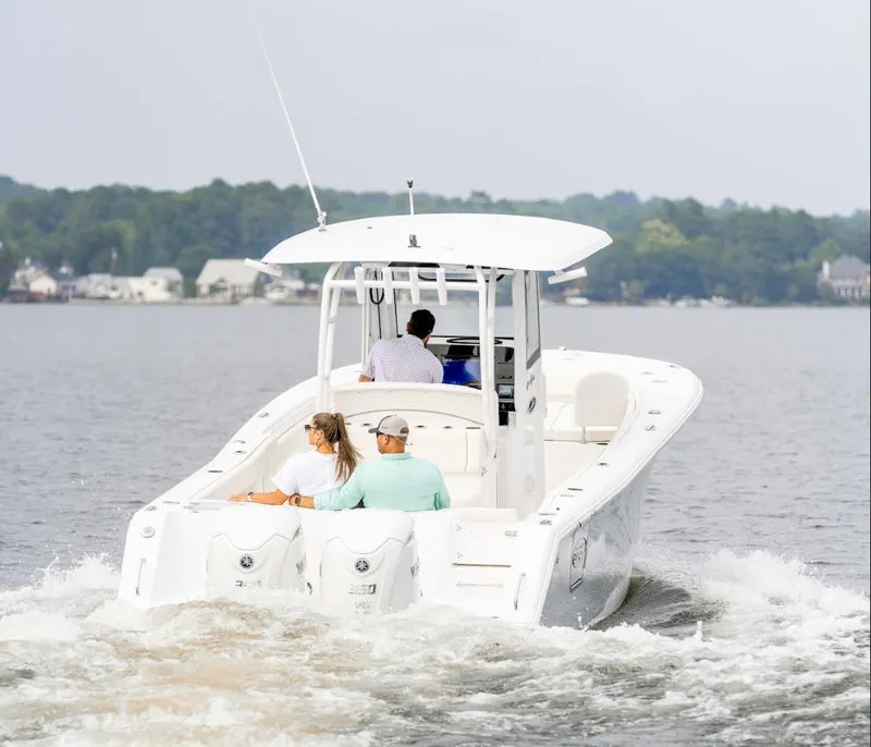 Slide: The Image of 2025 Sea Hunt Gamefish 30 cruising on a lake with passengers onboard. - 15