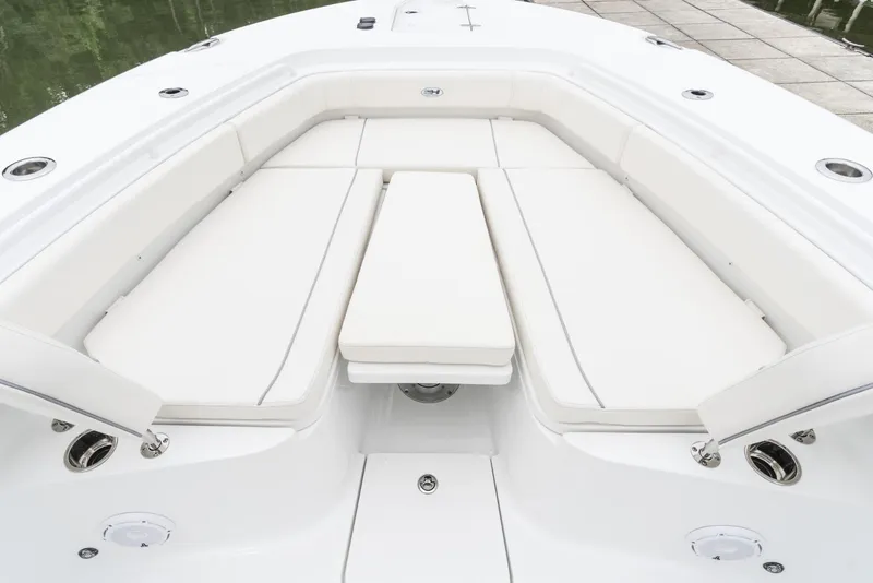 Slide: The Image of 2025 Sea Hunt Gamefish 30 Forward Seating, spacious white cushioned deck area. - 22