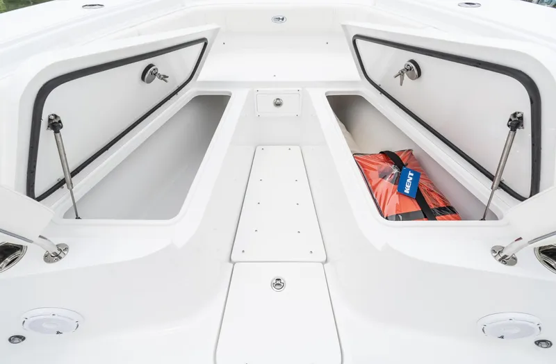 Slide: The Image of 2025 Sea Hunt Gamefish 30 Forward Seating storage compartments with life jackets. - 28