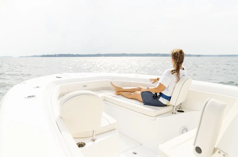 Slide: The Image of Person relaxing on a 2025 Sea Hunt Gamefish 30 boat, enjoying the ocean view. - 36
