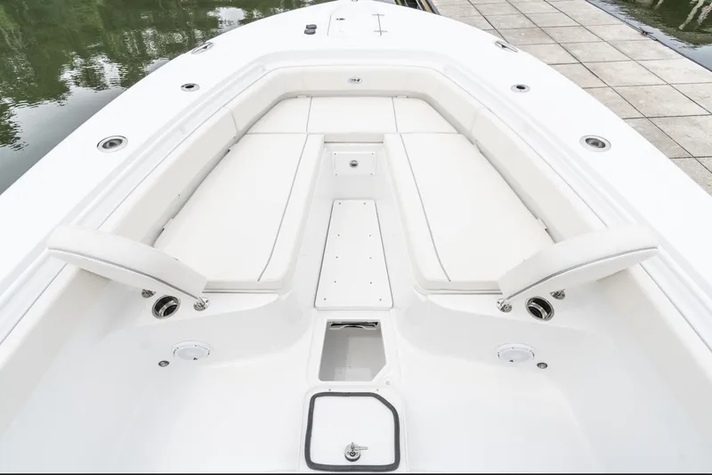 Slide: The Image of 2025 Sea Hunt Gamefish 30 Forward Seating, spacious white deck with seating and storage. - 37