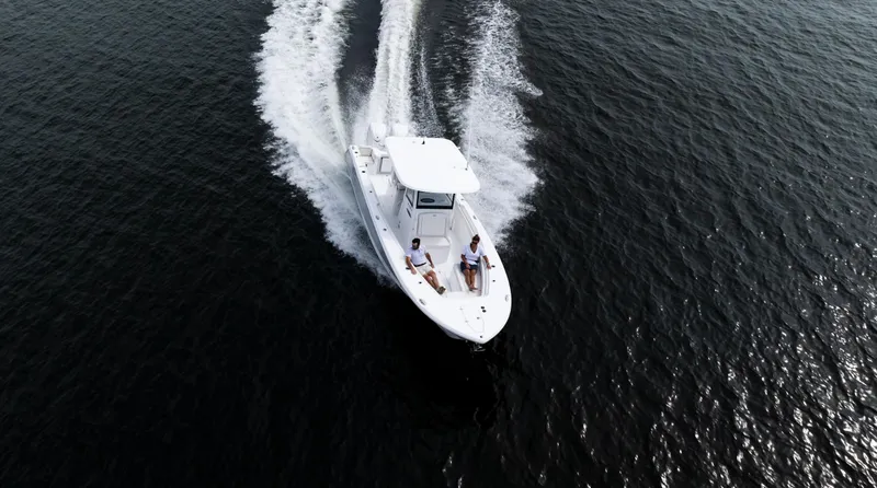 Slide: The Image of 2025 Sea Hunt Gamefish 30 cruising on open water, aerial view. - 5