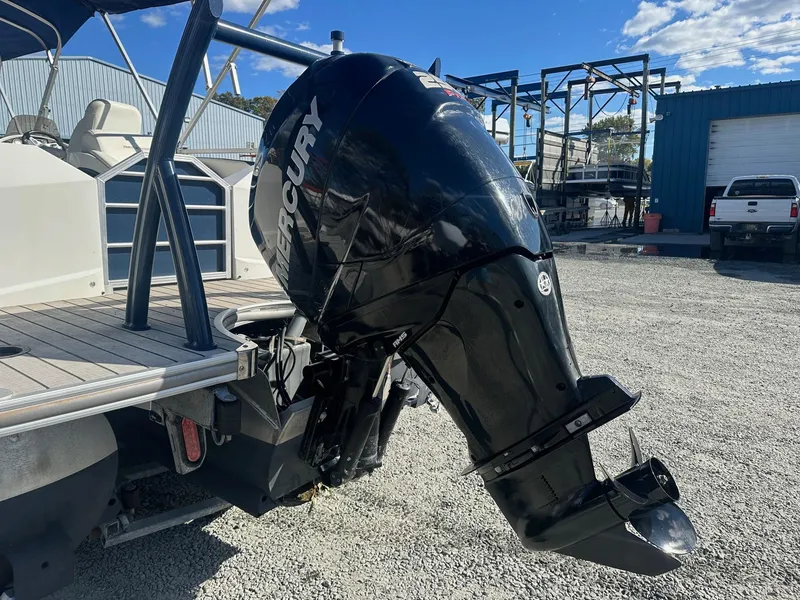 Slide: The Image of 2017 Berkshire 23SLX STS Entertainment boat with Mercury outboard motor. - 13
