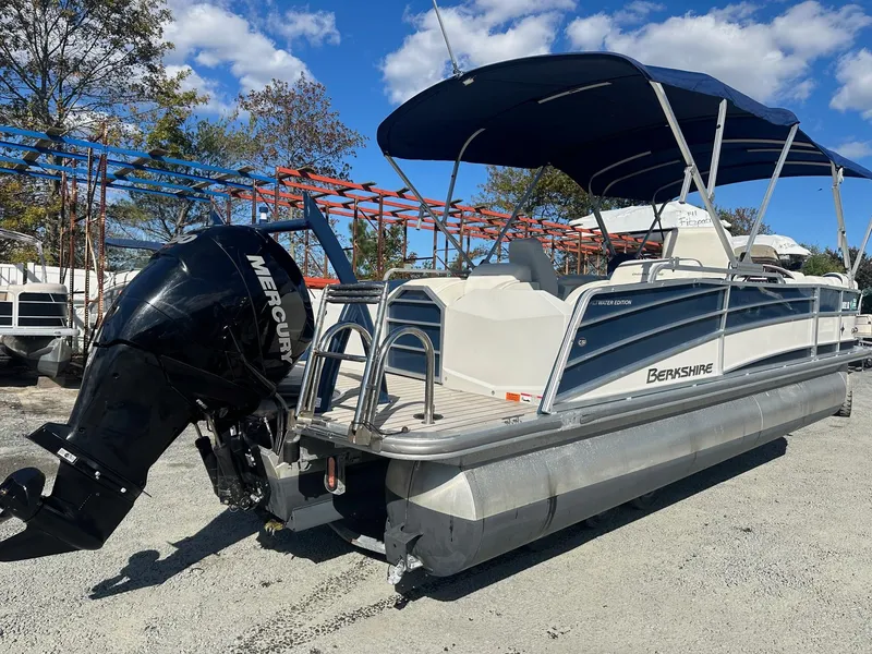 Slide: The Image of 2017 Berkshire 23SLX STS Entertainment pontoon boat with Mercury outboard motor. - 3