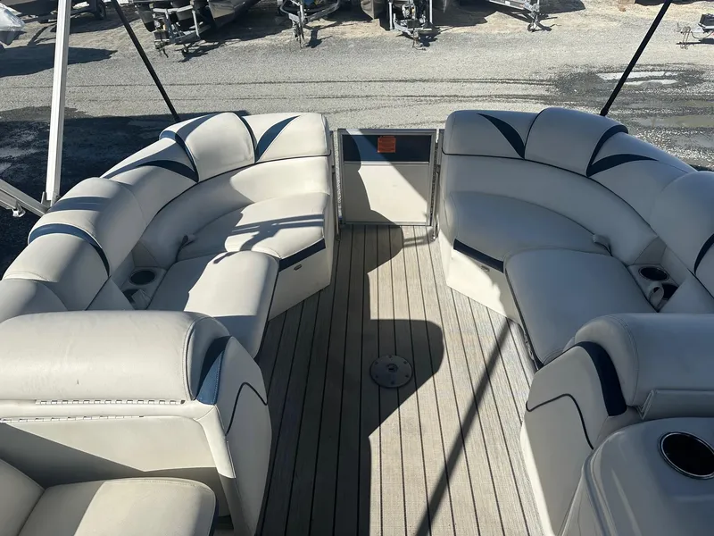 Slide: The Image of 2017 Berkshire 23SLX STS Entertainment boat with spacious seating and sleek design. - 7