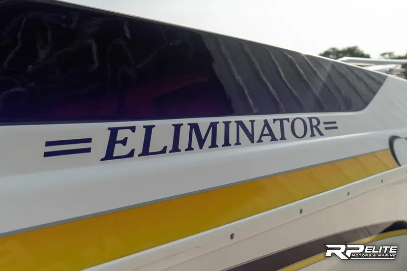 Slide: The Image of 2000 Eliminator 220 Eagle XP boat with bold branding and sleek design. - 17