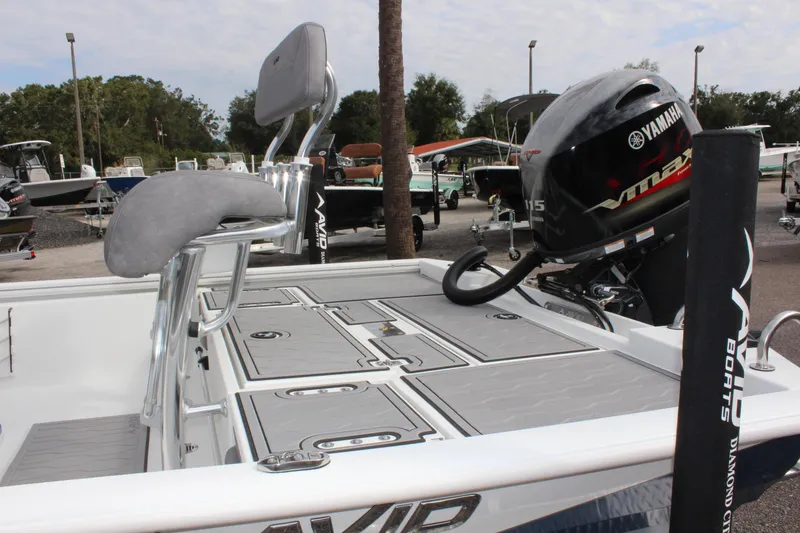 Slide: The Image of 2025 Avid 19 FSX boat with Yamaha motor, featuring sleek seating and storage compartments. - 11
