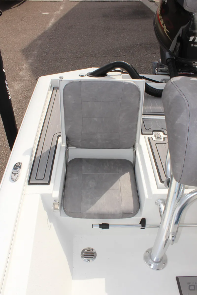 Slide: The Image of 2025 Avid 19 FSX boat seat with gray upholstery and sleek design. - 15
