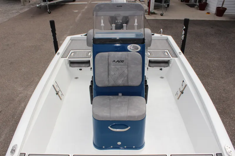 Slide: The Image of 2025 Avid 19 FSX boat interior with blue and gray seating. - 35