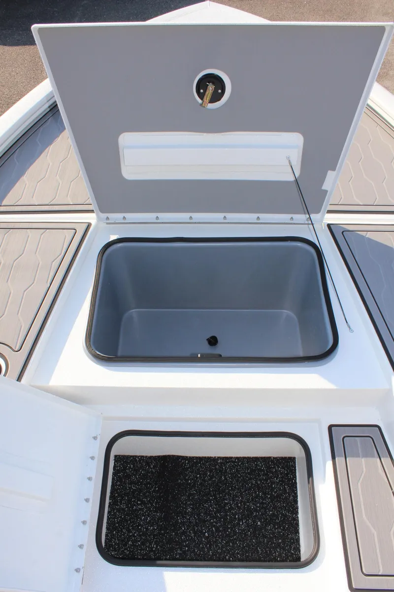 Slide: The Image of 2025 Avid 23 FSX boat storage compartments, open and ready for use. - 26