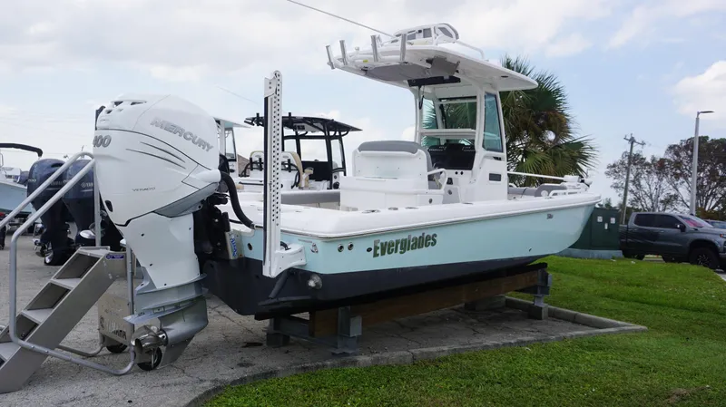 Slide: The Image of 2023 Everglades 253 CC boat with Mercury engine on display. - 3