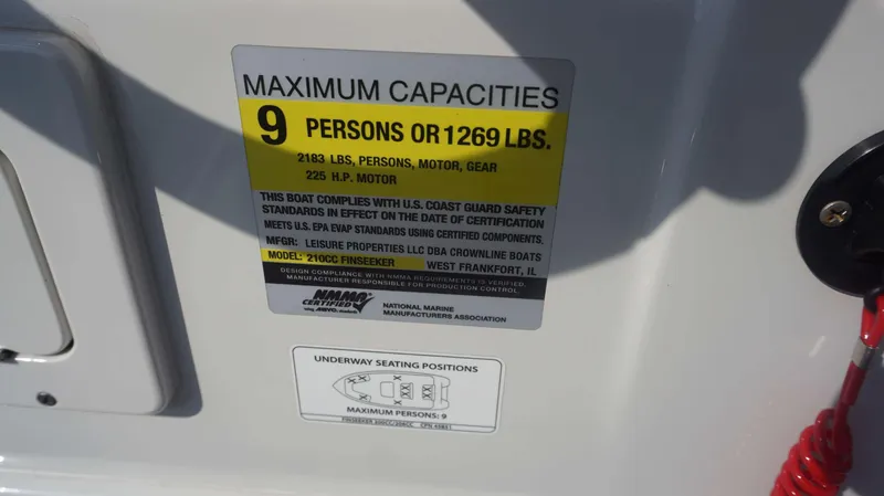 Slide: The Image of Capacity label on 2023 Finseeker 210 FC boat, max 9 persons or 1269 lbs. - 18