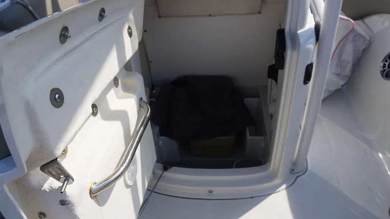 Slide: The Image of 2023 Finseeker 210 FC boat interior storage compartment. - 8