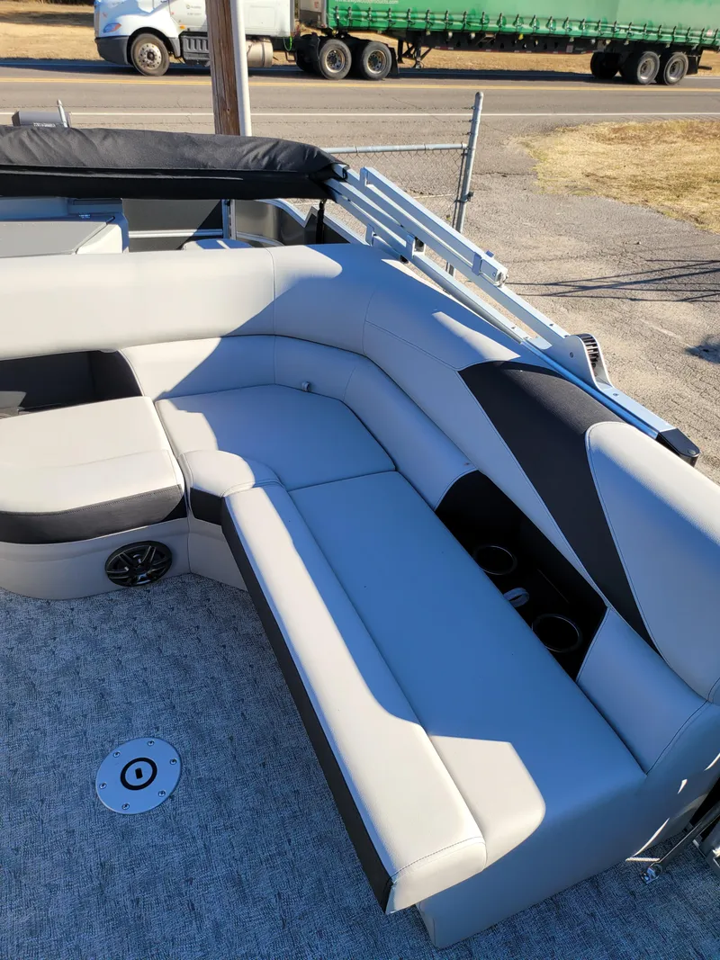 Slide: The Image of 2025 Trifecta 22TRFCLE boat interior with sleek seating and cup holders. - 10