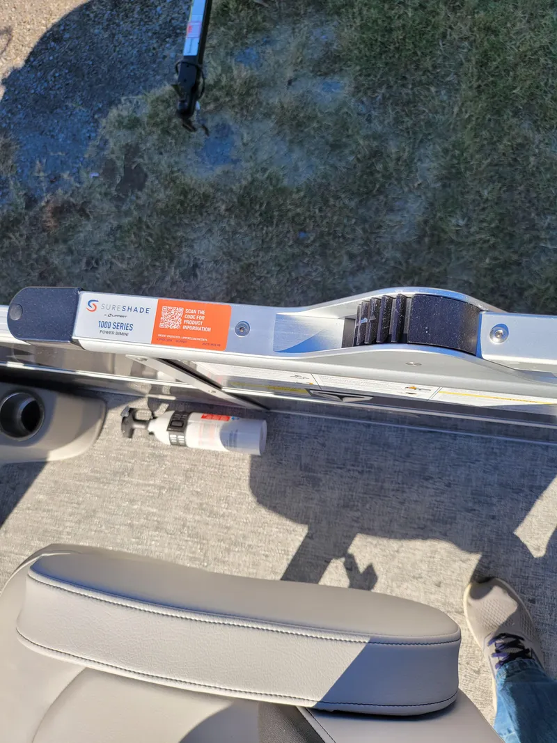 Slide: The Image of 2025 Trifecta 22TRFCLE boat interior with safety equipment and seating. - 15