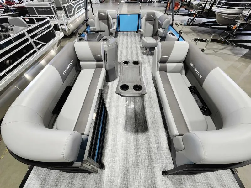 Slide: The Image of 2025 Bennington 20SSR pontoon boat interior with gray seating and modern design. - 2