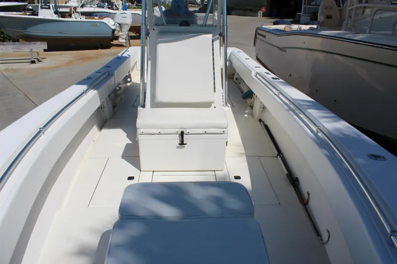 Slide: The Image of 2002 Contender 31 CC boat interior with seating and console. - 17