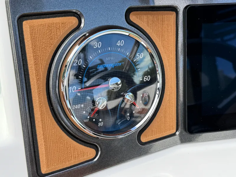 Slide: The Image of 2025 Sanger 231SL speedometer with wood accents and modern design. - 18