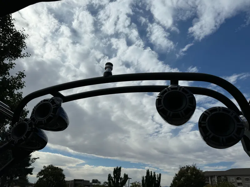 Slide: The Image of Silhouette of Sanger 231SL speakers against a cloudy sky, 2025 model. - 27