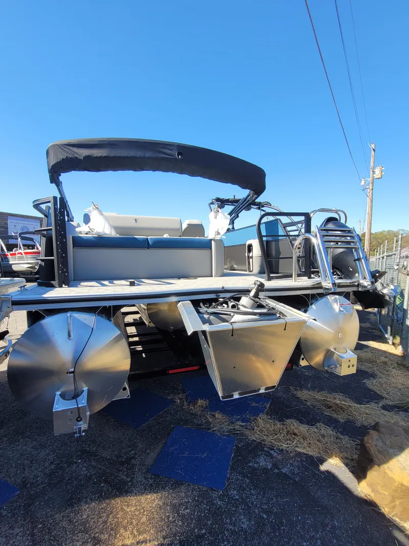 Slide: The Image of 2025 Trifecta 24ULLET275 pontoon boat with sleek design and modern features. - 13