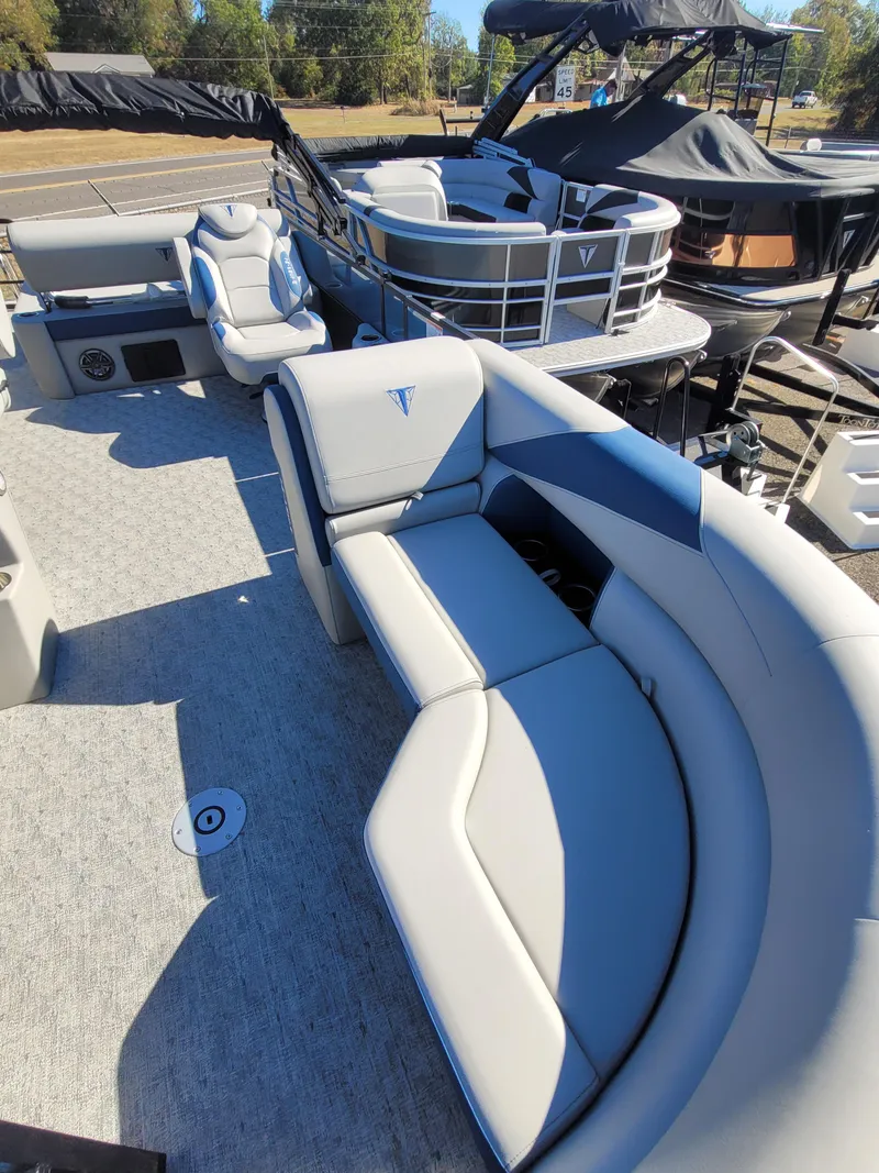 Slide: The Image of 2025 Trifecta 24ULLET275 pontoon boat with spacious seating and modern design. - 6