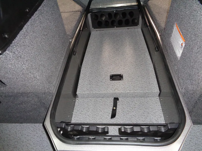 Slide: The Image of 2025 Lund 1875 Impact XS Sport boat interior storage compartment. - 22