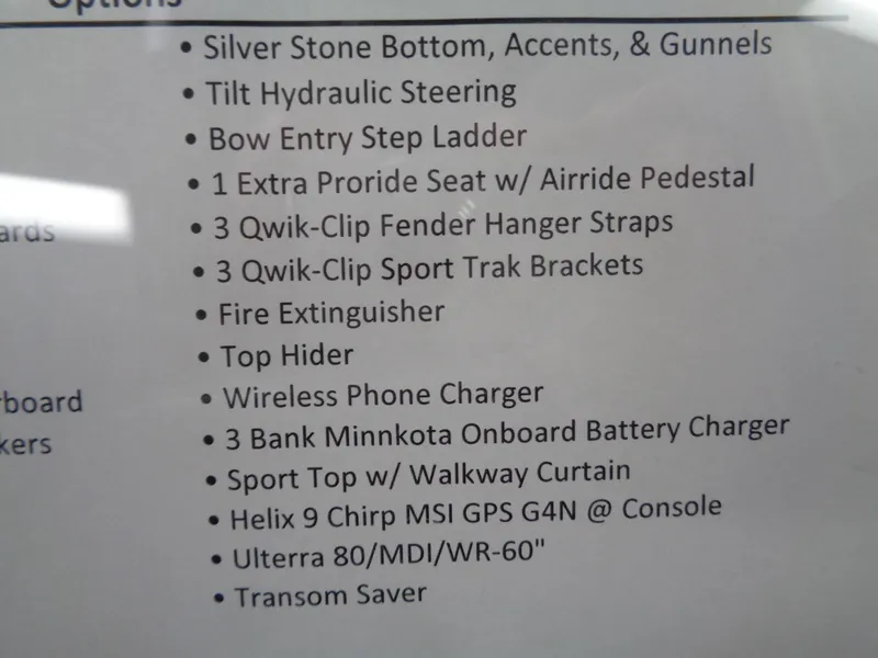 Slide: The Image of Options list for 2025 Lund 1875 Impact XS Sport boat, featuring advanced accessories. - 33