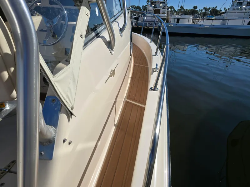 Slide: The Image of 2009 Grady-White Marlin 300 boat deck with stainless steel railings. - 15