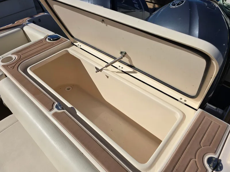Slide: The Image of Open storage compartment on 2009 Grady-White Marlin 300 boat. - 23