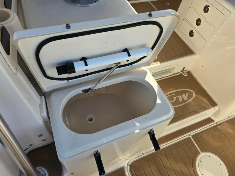 Slide: The Image of Open storage compartment on 2009 Grady-White Marlin 300 boat deck. - 24