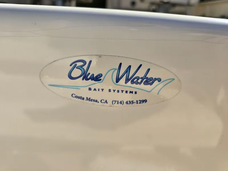 Slide: The Image of Blue Water Bait Systems logo on 2009 Grady-White Marlin 300 boat, Costa Mesa, CA. - 25
