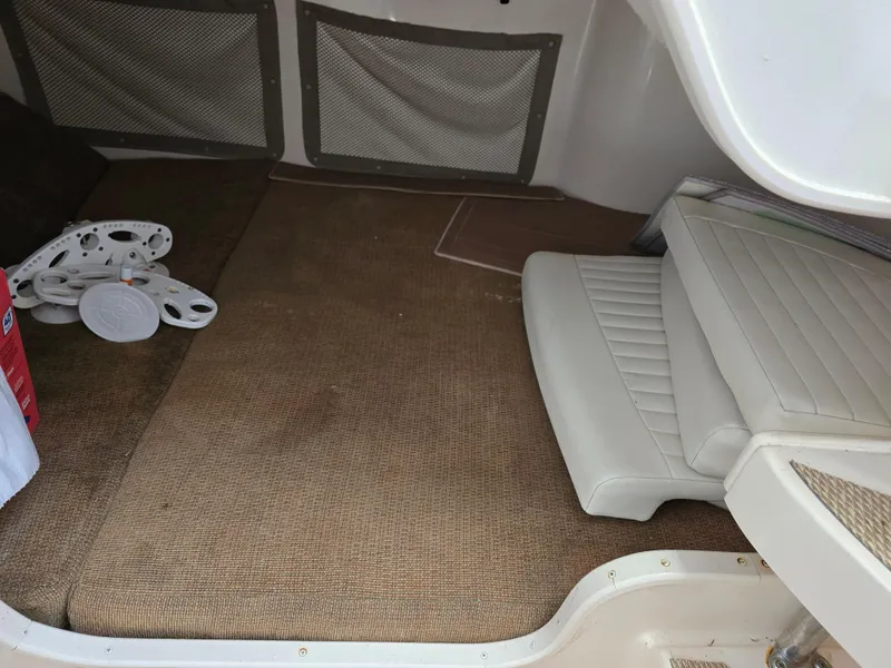 Slide: The Image of Interior cabin of 2009 Grady-White Marlin 300 boat with seating and storage. - 34