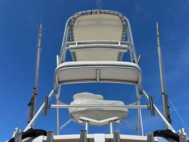 Slide: The Image of Grady-White Marlin 300 boat tower against a clear blue sky, 2009 model. - 4