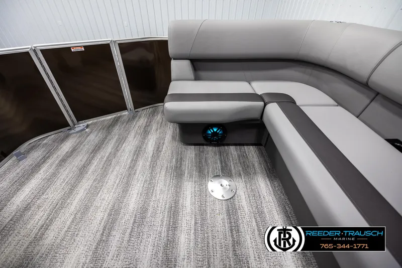 Slide: The Image of 2025 Bennington 21 SLSE pontoon boat interior with gray seating and carpet flooring. - 15