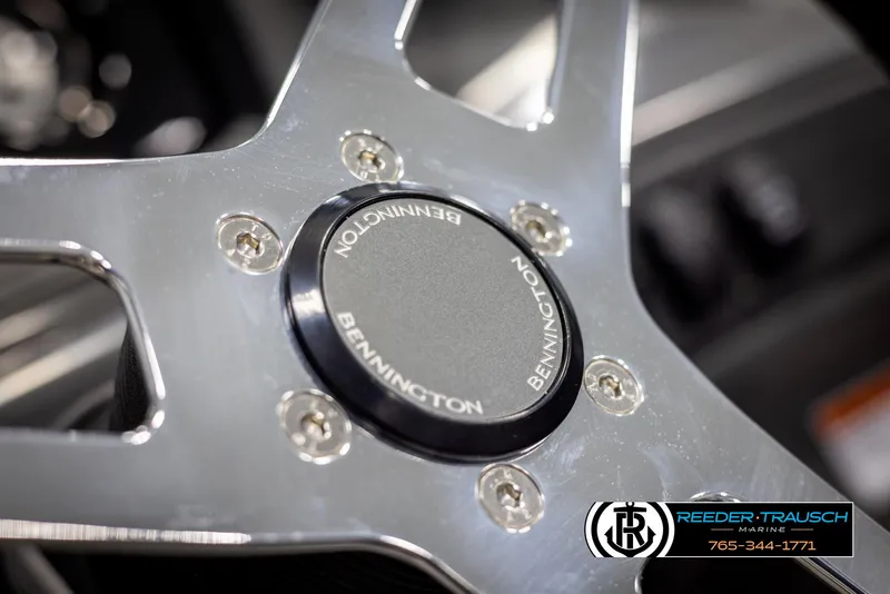 Slide: The Image of Close-up of 2025 Bennington 21 SLSE steering wheel with logo. - 28