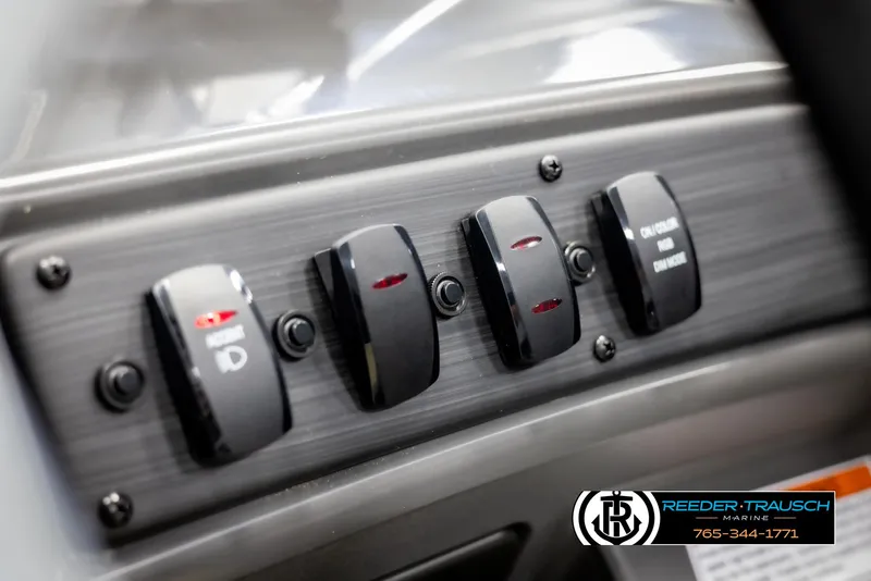 Slide: The Image of Close-up of 2025 Bennington 21 SLSE boat control panel switches. - 31